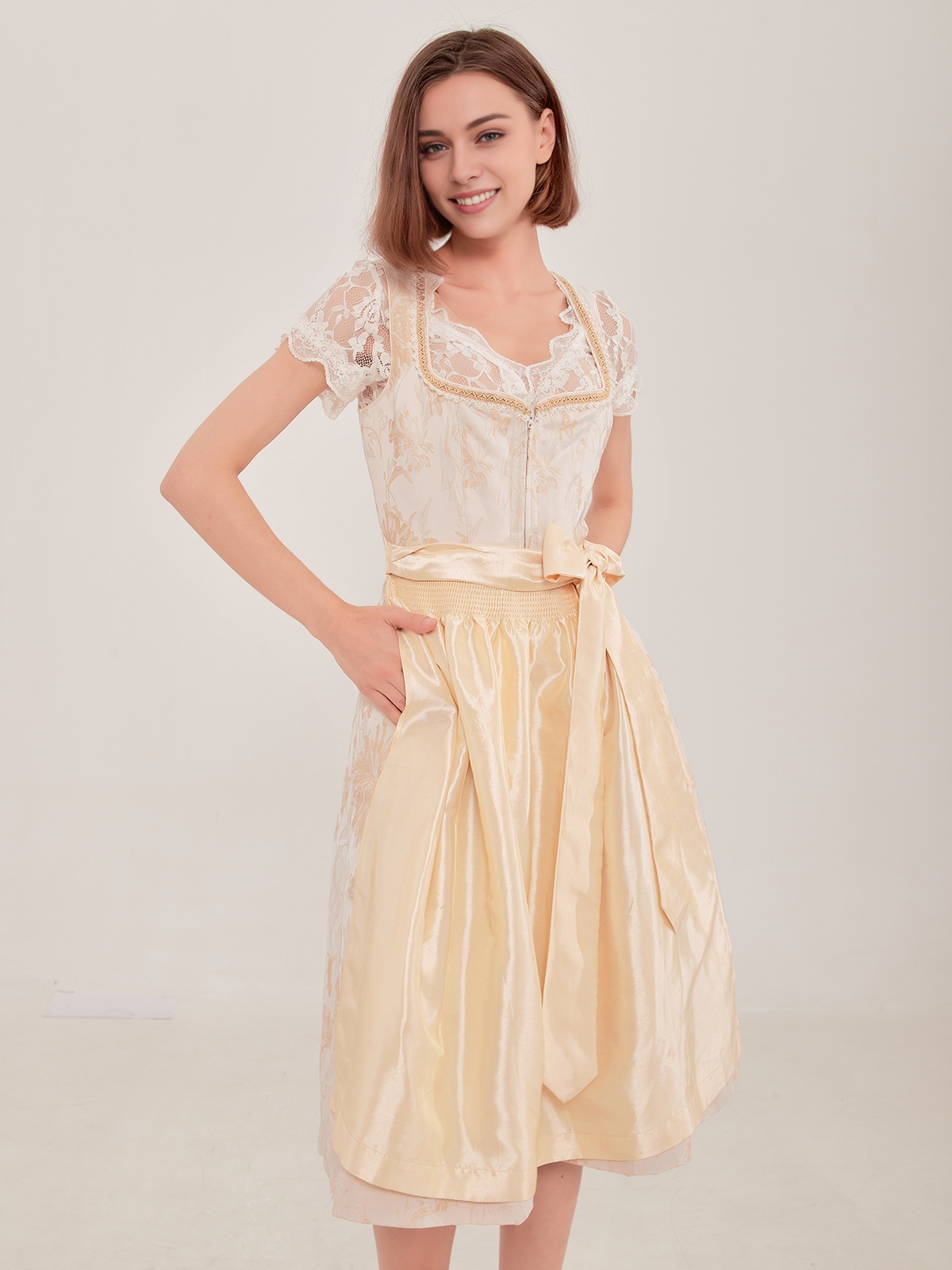 Alpenglanz Dirndl Grün in Gelb-Optik